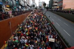 Anti-government protesters march demanding a second round presidential election, in La Paz, Bolivia, Oct. 24, 2019.