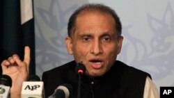 FILE - Pakistan’s Foreign Secretary Aizaz Chaudhry gestures during a press conference in Islamabad, Pakistan, May 8, 2015.