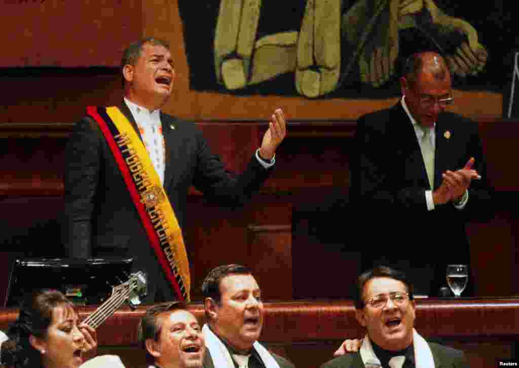 Ecuadorian President Rafael Correa sings during a special ceremony at the National Assembly in Quito.