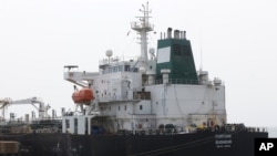 FILE - Iranian oil tanker Fortune is anchored at the dock of the El Palito refinery near Puerto Cabello, Venezuela, May 25, 2020. 