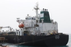 FILE - Iranian oil tanker Fortune is anchored at the dock of the El Palito refinery near Puerto Cabello, Venezuela, May 25, 2020.