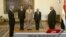 This screen grab from state television shows Egypt's interim President Adly Mansour (R) swearing in Ahmed Galal (L) as finance minister in Cairo, Tuesday, July 16, 2013.