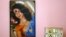 A portrait of Savita Halappanavar is seen on the wall of her parents' home in Belgaum in the southern Indian state of Karnataka, November 16, 2012. 