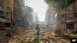 Smoke rises from the site of an Israeli airstrike in Dahiyeh, Beirut, Lebanon, Oct. 3, 2024.