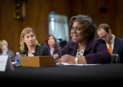 FILE - In this Jan. 9, 2014, file photo Assistant Secretary of State for African Affairs Linda Thomas-Greenfield, right, testifies during a Senate Foreign Relations Committee hearing on Capitol Hill in Washington.