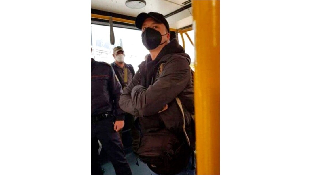 Belarus journalist Raman Pratasevich stands in an airport bus in the international airport outside Minsk, Belarus, May 23, 2021, in this photo released by telegram Chanel t.me/motolkohelp.