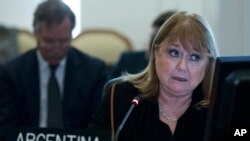 FILE - Argentina's Foreign Minister Susana Malcorra speaks at the Permanent Council of the Organization of American States in Washington, April 3, 2017.