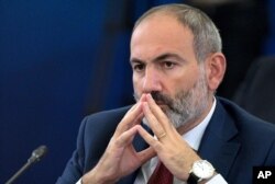 FILE - Armenian Prime Minister Nikol Pashinyan attends the Eurasian Economic Council in Yerevan, Armenia, on Oct. 1, 2019.