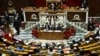 France's Prime Minister Francois Bayrou, center, speaks at the National Assembly, France's lower house parliament, in Paris, Feb. 5, 2025.