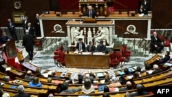 France's Prime Minister Francois Bayrou, center, speaks at the National Assembly, France's lower house parliament, in Paris, Feb. 5, 2025.