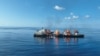 (FILE) Explosions take place on the deck of the Greek-flagged oil tanker Sounion on the Red Sea, in this handout picture released August 29, 2024. 