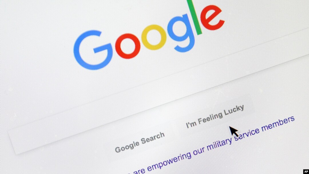 A cursor moves over Google's search engine page on Aug. 28, 2018, in Portland, Ore.