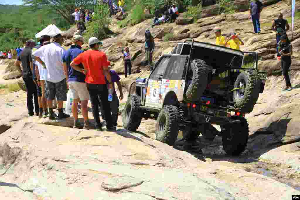 A car attempts the &ldquo;Gauntlet,&rdquo; the most difficult section of Rhino Charge, in Narok county, Kenya, May 30, 2016. In the annual event, speed is not the name of the game &mdash; in fact, there is a 40-kilometer per hour limit. Chargers must instead reach as many checkpoints as possible in ten hours, using the shortest distance&nbsp; &mdash; meaning that technical skill and luck are required in surmounting rocks, rivers, mud, and bush. (J. Craig/VOA) &nbsp;