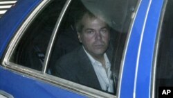 FILE - John Hinckley Jr. arrives at U.S. District Court in Washington, Nov. 18, 2003.