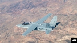 This Aug. 4, 2017, photo provided by the U.S. Air Force shows a Textron Scorpion experimental aircraft as it conducts handling and flying quality maneuvers above White Sands Missile Range near Alamagordo, N.M. The Scorpion is participating in test flights for the light-attack experiment known as the OA-X initiative being conducted Aug. 9, 2017, at Holloman Air Force Base in New Mexico. 