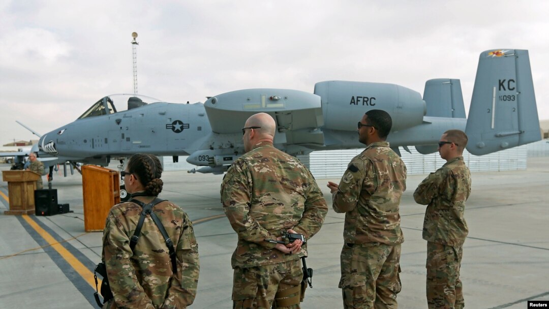 U.S air force personnel stand by an U.S. A-10 aircraft, one of a squadron that arrived at the Kandahar air base, Afghanistan, Jan. 23, 2018.
