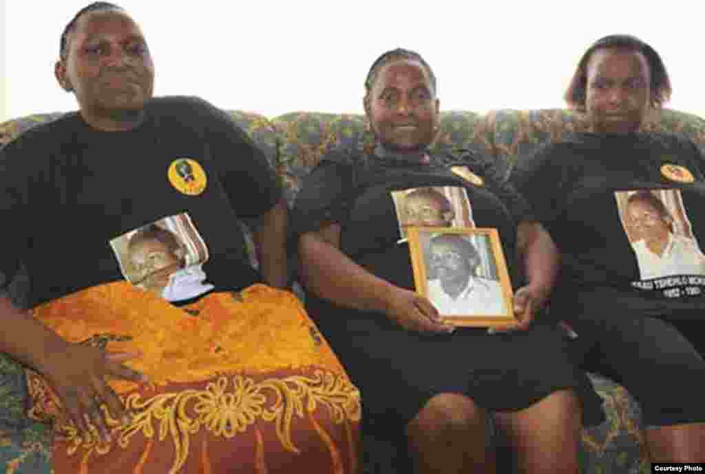 Older AZAPO members wear shirts honoring a deceased party supporter in Johannesburg (Courtesy AZAPO).