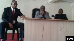 MDC-T leader Morgan Tsvangirai (center) addressing a press conference in Harare accompanied by party spokesperson Obert Gutu and James Timba. 