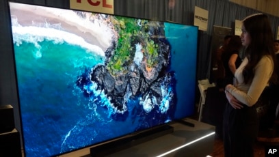 With holidays approaching, US stores stock more supersize TV sets