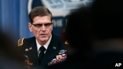 Gen. Joseph Votel speaks during a news conference with Defense Secretary Jim Mattis at the Pentagon, April 11, 2017. The commander of U.S. Central Command said it is looking to counter Iranian influence in the Middle East via cyberspace.