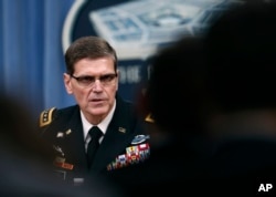 FILE - Gen. Joseph Votel speaks during a news conference at the Pentagon, April 11, 2017.