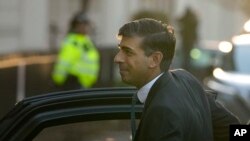 Britain's Prime Minister Rishi Sunak arrives at the COVID Inquiry at Dorland House in London, Monday, Dec. 11, 2023.