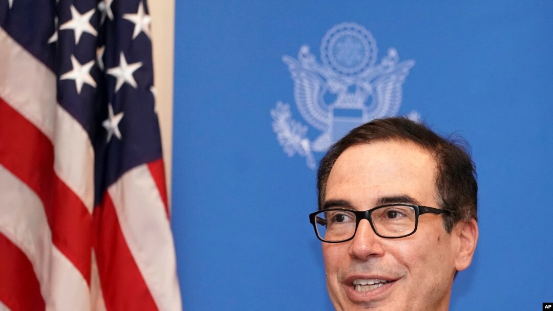 Steven Mnuchin, U.S. Treasury Secretary speaks to media at the venue of G20 Finance Minister and Central Bank Governors Meeting Saturday, June 8, 2019, in Fukuoka, western Japan. (AP Photo/Eugene Hoshiko)