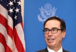 FILE - Steven Mnuchin, U.S. treasury secretary speaks to media at the venue of G-20 finance ministers and central bank governors meeting, June 8, 2019, in Fukuoka, Japan.