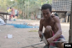 Mean Seum, chief of Porabun village, is concerned about rice farming in his community, in Banteay Meanchey province, Feb. 22, 2019. (Sun Narin/VOA Khmer)