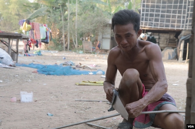 Mean Seum, chief of Porabun village, is concerned about rice farming in his community, in Banteay Meanchey province, Feb. 22, 2019. (Sun Narin/VOA Khmer)