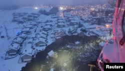 A rescue helicopter view shows the aftermath of a landslide at a residential area in Ask village, about 40km north of Oslo, Norway December 30, 2020.