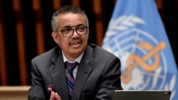 FILE - World Health Organization Director-General Tedros Adhanom Ghebreyesus attends a news conference in Geneva
