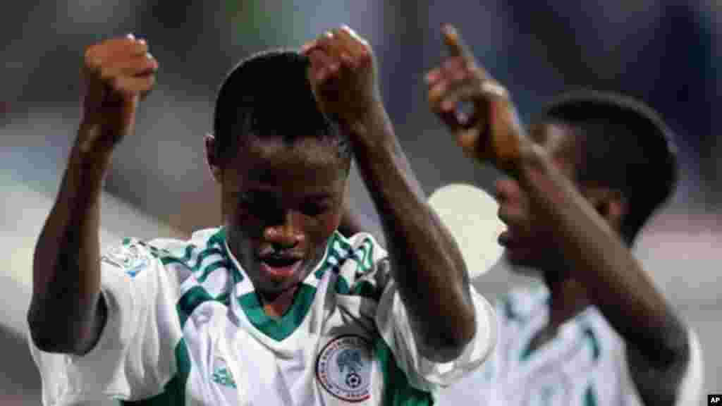 Chidera Ezeh of Nigeria celebrates after scoring a goal against Sweden during a semifinal match of the World Cup U-17 in Dubai.