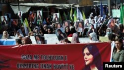Women protest in the Kurdish-controlled city of Qamishli over the death of Mahsa Amini in Iran