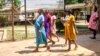 A group of pregnant women take time out from the maternity ward to walk and exercise at Karanda Mission Hospital in Mount Darwin on March 2, 2024.