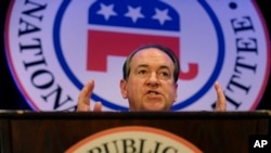 FILE - Former Arkansas Gov. Mike Huckabee speaks at the 2014 Republican National Committee winter meeting in Washington.