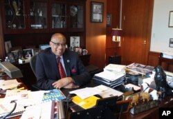 FILE - U.S. District Judge Michael Davis, shown in Minneapolis, July 8, 2015, initially allowed terror suspect Abdullahi Yusuf, 19, to live at a halfway house pending sentencing, provided he participate in a program aimed at helping disaffected youth.