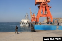 FILE - Cranes at one of the three berths at Gwadar port.