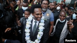 Mozambique opposition leader Venancio Mondlane arrives at the Maputo International Airport, after fleeing in the days following a hotly contested election in October, in the capital Maputo, Jan. 9, 2025.