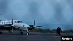 FILE - A plane believed to have carried Mexican drug lord Ismael "El Mayo" Zambada and Joaquin Guzman Lopez is seen on the tarmac of the Dona Ana County private airport, in Santa Teresa, New Mexico, July 25, 2024. 