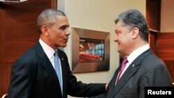 Predsednik Barak Obama i novoizabrani ukrajinski predsednik Petro Porošenko prilikom susreta u Varšavi, 4. jun 2014. 