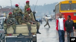 FILE - Members of the Ethiopian army patrol the streets of Addis Ababa, Ethiopia, June 10, 2005. Thursday, a confrontation in the town of Soda in the country's restive Oromia region resulted in the shooting death of four civilians at the hands of Ethiopian soldiers.