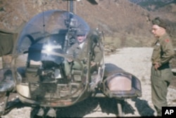 Albert Starr (in helicopter) as a as a young surgeon in Korea