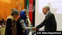 U.S. Ambassador to Afghanistan, Michael McKinley congratulates women civil society leaders.