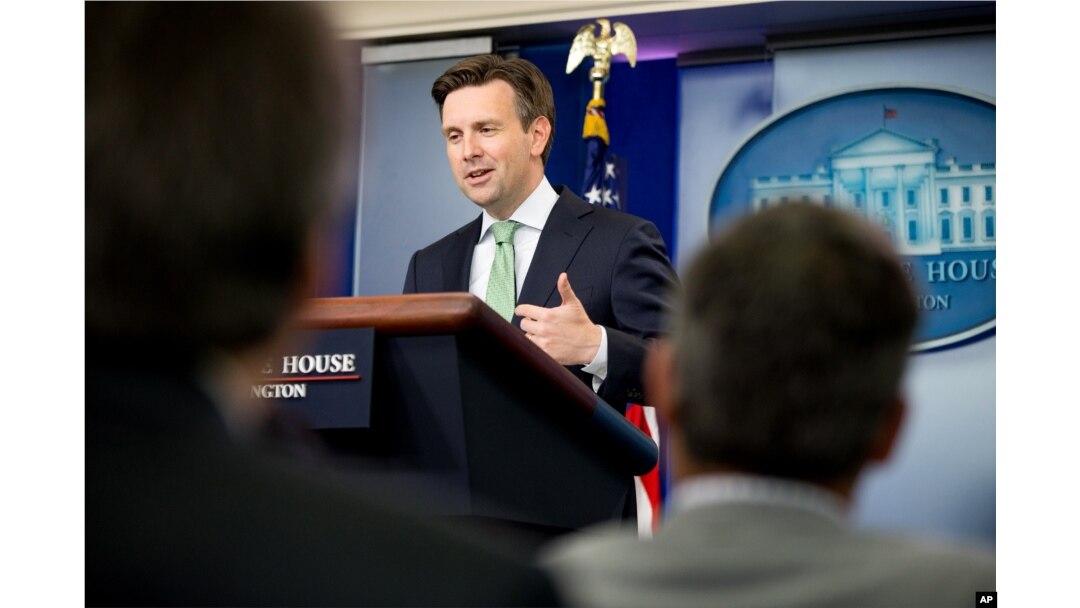 FILE - White House press secretary Josh Earnest at a White House press briefing in Washington, Sept. 18, 2015. Earnest called Trump's calls for a ban on Muslims entering the country "offensive and toxic."