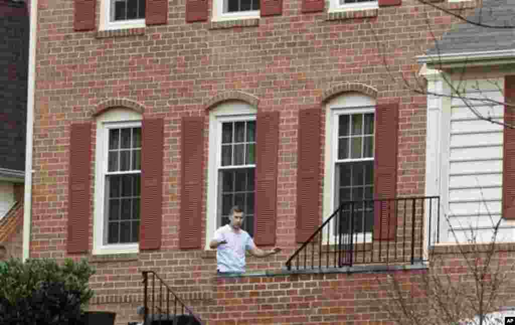 Ruslan Tsarni, the uncle of the Boston Marathon bombing suspects, walks into his home in Montgomery Village in Md. Friday, April, 19, 2013. 