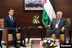 FILE - Palestinian President Mahmoud Abbas meets with White House senior adviser Jared Kushner in the West Bank city of Ramallah, June 21, 2017.