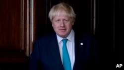 In the crucial days before Foreign Secretary Boris Johnson embraced Britain’s “leave campaign,” he wrote a newspaper column explaining why Britain should remain inside the European Union _ but those forceful words were never published before Britain’s June 23 vote. 