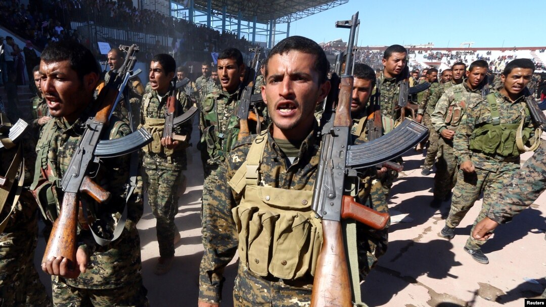 Pasukan Demokratik Suriah merayakan peringatan pertama pembebasan Provinsi Raqqa dari ISIS, di Raqqa, Suriah, 27 Oktober 2018.