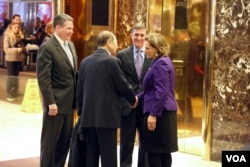 Retired Lt. General Michael Flynn — Trump's pick for national security adviser — is seen with Maurice "Hank" Greenberg and K.T. McFarland at Trump Tower in New York, Dec. 12, 2016. (R. Taylor/VOA)